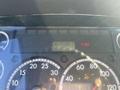 Dashboard display of a 2006 Freightliner M2 106 showing the odometer reading of 1035882 kilometers and various instrument gauges