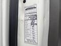 A service label attached to the inside of a 2006 Freightliner M2 106 listing performed services and mileage including oil and filter changes and other maintenance details