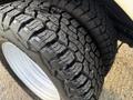 Close-up of the rugged tires of a 2018 Ford F-350 showcasing deep treads designed for off-road traction and durability