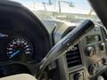The image shows the interior of a 2017 Ford F-350 SD focusing on the steering wheel control lever and dashboard with a speedometer and various buttons and dials