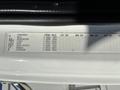 Label of a 2006 Freightliner M2 106 showing specifications for various components including axle suspension tires rims hubs spokes brakes and steering