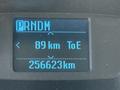 Image shows the dashboard display of a 2015 Ford Transit showing gear selection PRNDM distance to empty 89 km and total distance 256623 km