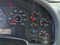 Dashboard of a 2006 International 7500 displaying various gauges for speed fuel voltage and air pressure