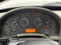 Dashboard of a 2013 International Workstar 7500 showing gauges for RPM water temperature oil pressure speed fuel and voltage