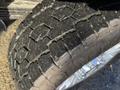 Close-up of a rugged tire tread on a 2020 Ford F-350 showing deep grooves and a strong grip pattern designed for off-road performance