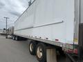 A 2010 Great Dane 45-foot trailer with a white exterior parked alongside other vehicles