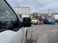 A 2017 Ford F-150 is parked with its driver's side mirror visible in the foreground