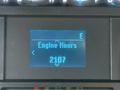 Display panel showing engine hours with the number 2107 on a digital screen