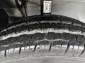 Close-up of a tread on a tire from a 2023 RAM Promaster 3500 showcasing the detailed pattern and texture of the rubber
