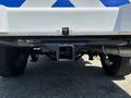 A 2017 Chevrolet Colorado with a visible hitch receiver underneath the rear bumper and part of the truck's exhaust system