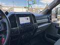 Interior view of a 2022 Ford F-350 SD showing the dashboard with a touchscreen display and controls