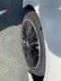 2014 Mercedes-Benz CLA-Class with a close-up view of a black alloy wheel and tire
