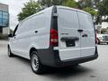 A 2020 Mercedes-Benz Metris van in white with a black rear panel and rear doors closed
