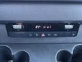Control panel of a 2024 Mercedes-Benz Sprinter 2500 with climate control settings and various function buttons
