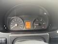 Dashboard of a 2009 Dodge Sprinter Van displaying speedometer fuel gauge and warning lights