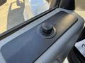 Control panel of a 2017 Ford F-650 Super Duty featuring a black knob for adjusting side mirrors