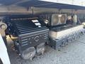 A 2022 Lion Lion6 electric vehicle with visible black battery pack and two cooling fans installed beside the chassis