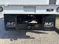 A 2019 Freightliner M2 106 truck viewed from the rear with a black bumper featuring the logos of Abanante Motor Group and contact information