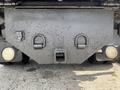 Underneath a 2016 RAM 5500 truck showing a textured bumper with tow hooks and two round fog lights