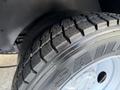 Close-up of a 2017 Ford F-550 tire showing tread detail and rim design