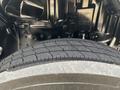Close-up view of a tire from a 2018 Hino 195 showing the tread pattern and surface details