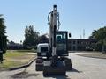 2010 Bobcat E80 compact excavator with tracks and a front bucket facing forward