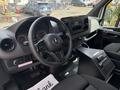 Interior view of a 2020 Mercedes-Benz Sprinter 2500 featuring a steering wheel dashboard controls and a modern console
