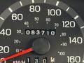 The speedometer of a 2002 Ford Econoline showing a speed of 30 km/h and an odometer reading of 83710 kilometers
