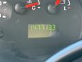 Dashboard of a 2007 Ford Econoline showing the odometer reading 1477133 miles