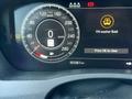 Dashboard display of a 2020 Jaguar XE showing speedometer, warning alert for low washer fluid, and odometer reading of 53361 km
