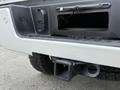 A 2017 Chevrolet Silverado 1500 showing the rear bumper with a hitch receiver and a connectivity port
