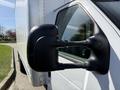 Side mirror of a 2023 Ford E-450 van showcasing its black plastic design and dual support arms