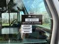 A close-up of a certification sticker on a vehicle, featuring the text "2027 British Columbia GM 82147 CERTIFICATE OF APPROVAL Expires Last Day of Month Shown JANUARY FEBRUARY MARCH"