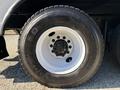 Close-up of a black tire with a white rim labeled Goodyear G282 MSD mounted on a vehicle