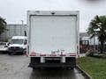 A white 2022 Ford Econoline moving truck viewed from the rear with a smooth surface and no visible markings