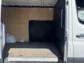 2022 Mercedes-Benz Sprinter cargo van with a spacious empty interior featuring wooden walls and a flat floor