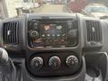 Dashboard of a 2017 RAM Promaster featuring a touchscreen display with navigation and control buttons for audio and climate settings
