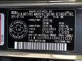 A vehicle identification label from a 2017 Kia Sorento displaying manufacturer details and specifications