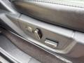A close-up of the seat adjustment controls inside a 2019 Ford F-150 showing buttons for adjusting the seat position and lumbar support