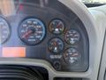 Dashboard of a 2008 International 7500 showing speedometer fuel gauge and various indicators including voltage and brake air levels