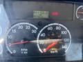 Dashboard of a 2007 Freightliner M2 106 displaying speedometer tachometer fuel gauge and digital odometer reading 3411068 km