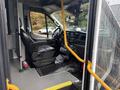 Interior view of a 2021 Ford Transit-350 showing the driver's seat dashboard and controls
