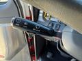 A close-up view of a control lever from a 2004 American LaFrance Eagle featuring wash lift and off-lo-hi settings