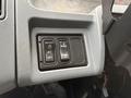 Dashboard controls of a 2006 International 4200 featuring three buttons labeled P OFF PANEL and PANEL