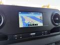 A 2020 Mercedes-Benz Sprinter dashboard featuring a navigation screen displaying a map with nearby roads and landmarks