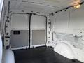 Interior of a 2020 Mercedes-Benz Metris cargo van showing empty cargo space with side and rear doors open