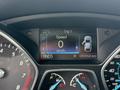 Dashboard display of a 2015 Ford Escape showing speed at 0 km/h trip information and odometer reading of 080956 km