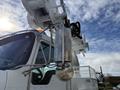 A 2008 Kenworth T370 truck with a polished fuel tank and hydraulic equipment mounted on its cab