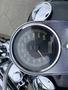 Close-up of a speedometer on a 2008 Harley-Davidson FLSTFI displaying speed in kilometers per hour and total distance traveled in kilometers