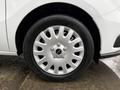 A close-up of a silver wheel with a 2017 RAM ProMaster City logo featuring multi-spoke design and a black tire with visible tread detail